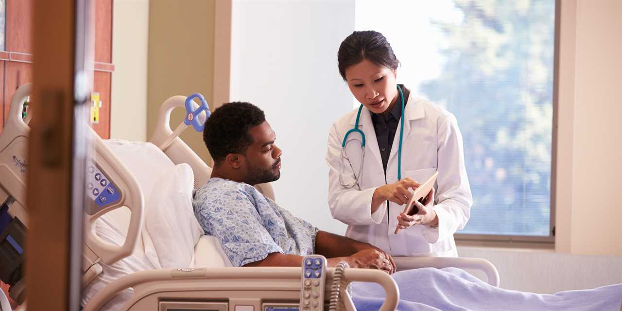 Doctor speaking to patient