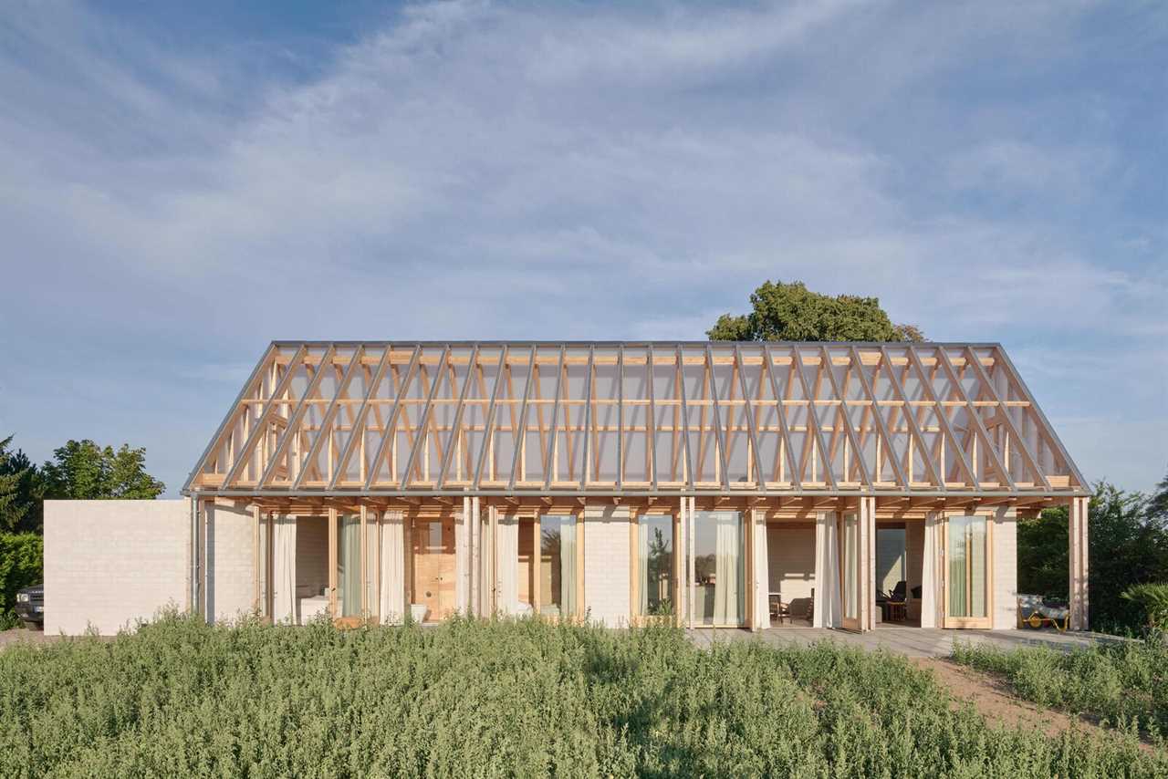 The See-Through Roof of This Brick Home Doubles as a Viewing Deck