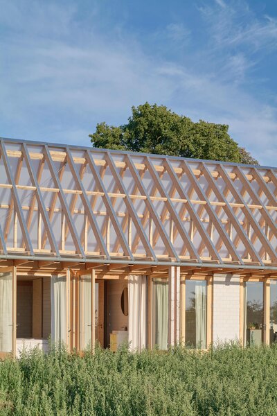 The See-Through Roof of This Brick Home Doubles as a Viewing Deck