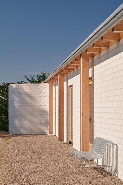 The See-Through Roof of This Brick Home Doubles as a Viewing Deck