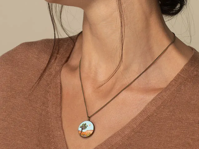 person wearing a national parks necklace