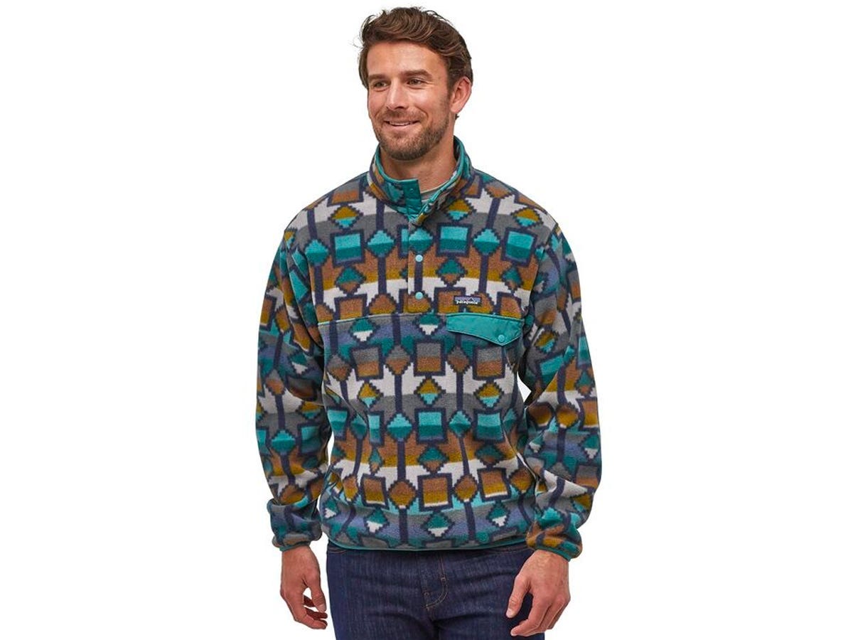 Man wearing patterned Patagonia Lightweight Synchilla Snap T Fleece Pullover