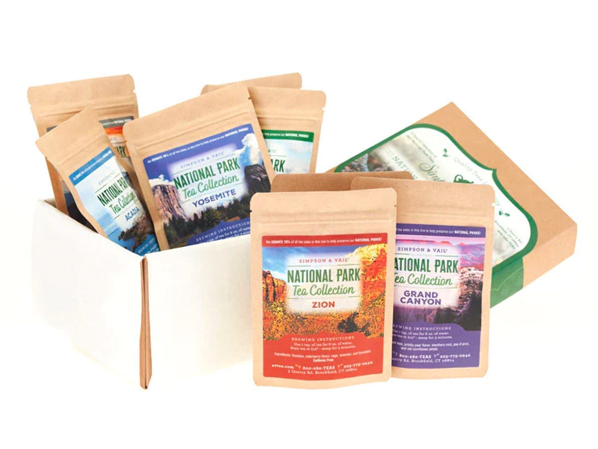 Gift box with 10 different packages of tea inspired by the flora, colors, environment, and overall scenery of the US National Parks.