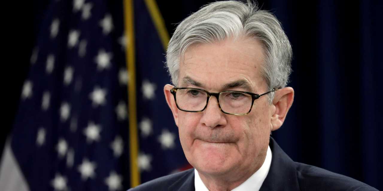 FILE PHOTO: Federal Reserve Chairman Jerome Powell holds a news conference following the two-day meeting of the Federal Open Market Committee (FOMC) meeting on interest rate policy in Washington, U.S., January 29, 2020. REUTERS/Yuri Gripas/File Photo