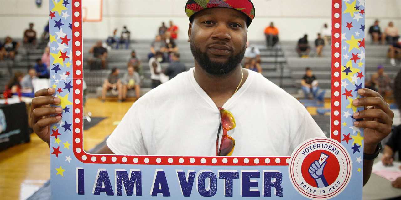 Jose Irby poses during an event held by the Florida Rights Restoration Coalition (FRRC) to clear the fines and fees of dozens of Florida residents with past felony convictions to help make it easier for them to vote, in Miami, Florida, on April 28, 2022.