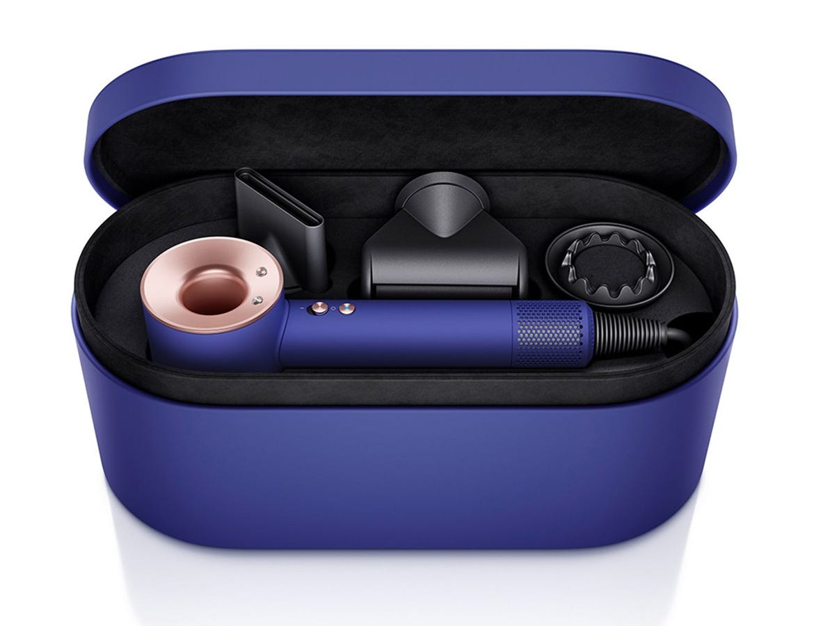 blue and pink Dyson Supersonic hair dryer in a blue box