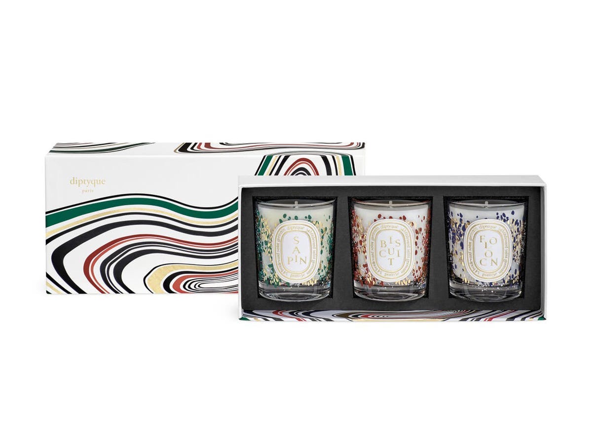 set of three diptyque candles with winter scents