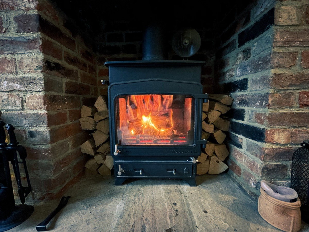 stove that circulates hot air to a desired temperature in a finished basement