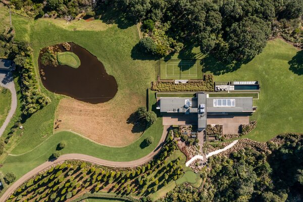 A Pahoia Point Estate in Bay of Plenty Comes With a Reflection Pool and Plenty of Dramatic Views