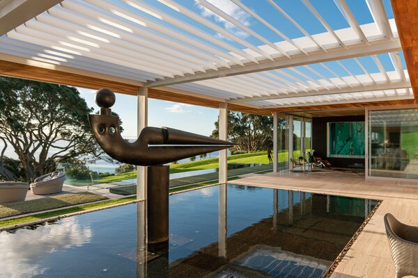 A Pahoia Point Estate in Bay of Plenty Comes With a Reflection Pool and Plenty of Dramatic Views