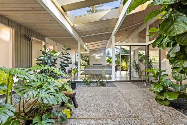 Expansive skylights stretch across the central atrium, ushering ample natural light inside.