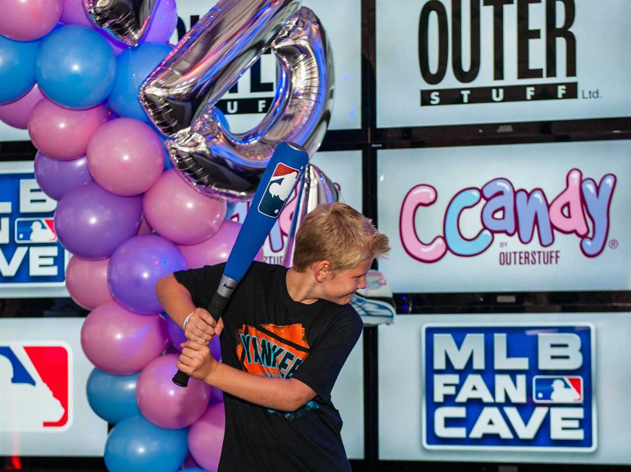 Children of the New York Yankees model a clothing line a press event hosted by Outerstuff in New York City.