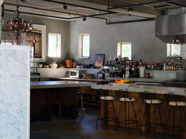 Deborah and Michael went to Carrera, Italy, to find the marble used in the kitchen counters. For heat mitigation, the stove’s hood uses a swamp cooler to condition the return air when it’s hot out.