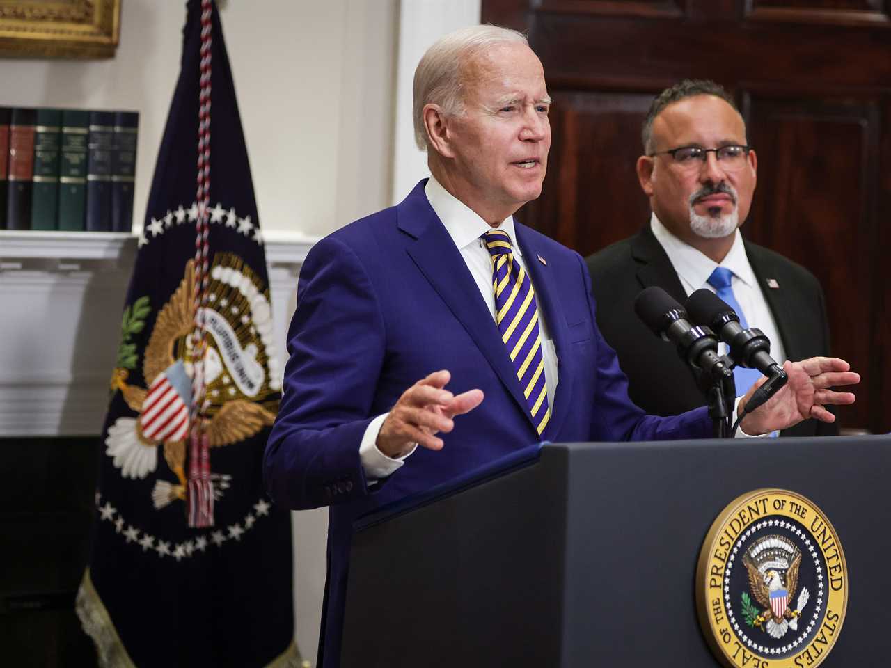 President Joe Biden and Education Secretary Miguel Cardona