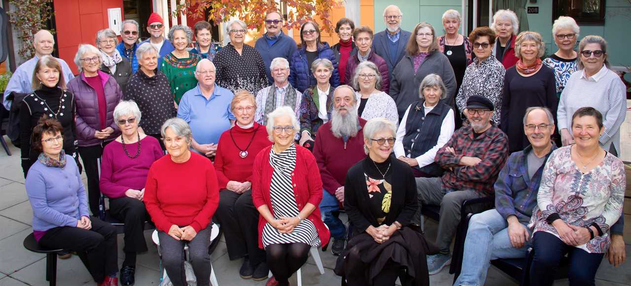 A group photo of the seniors who live at PDX Commons outside of Portland, Oregon.