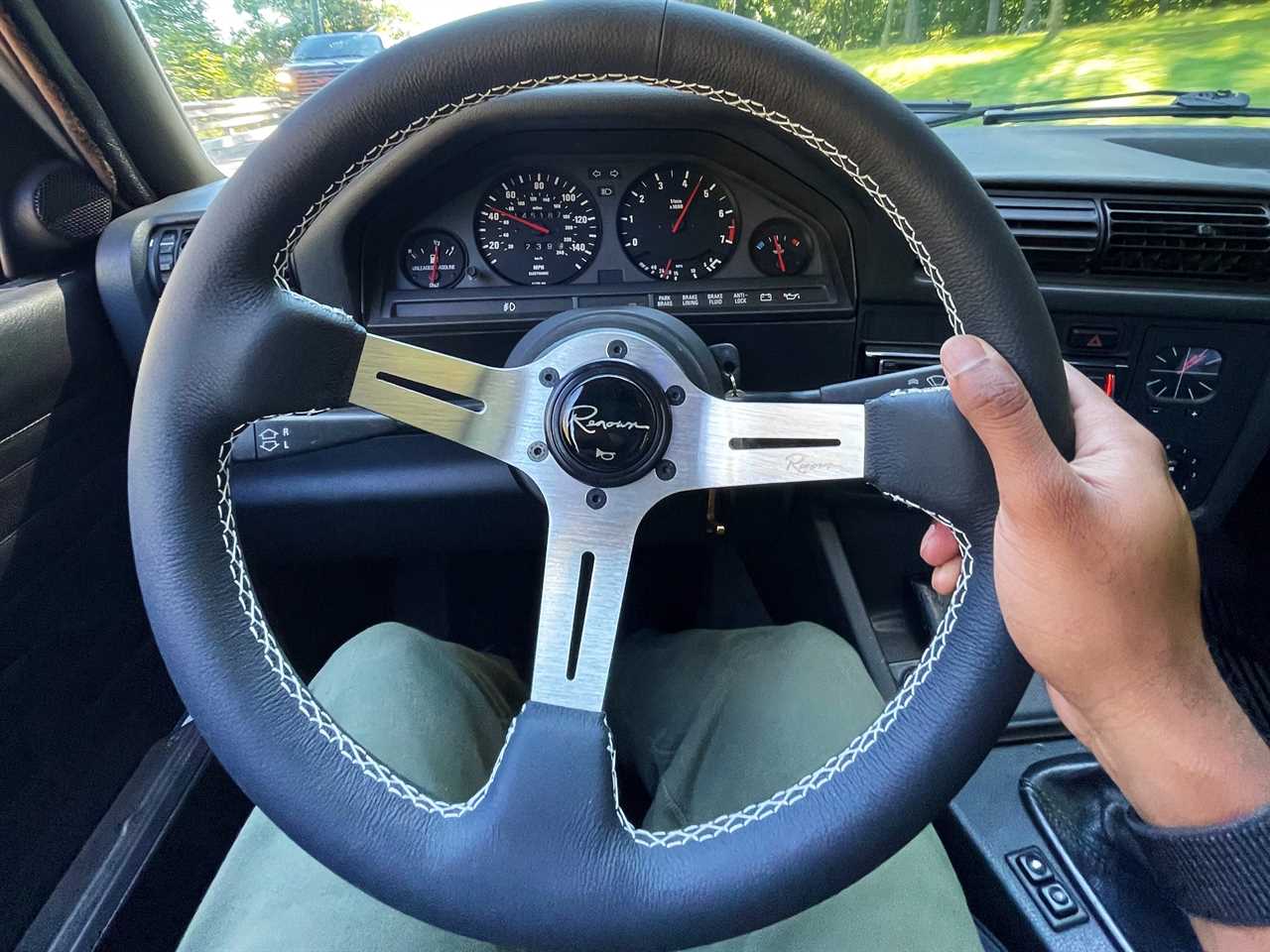 point of view of a person holding their steering wheel