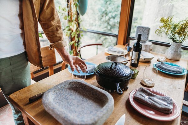 Matt Byrd’s laid-back table setting incorporates warm tones, textured patinas, and organic shapes. Fiestaware plates are joined by assorted vessels from Studio Touya and Nulio Ceramics.