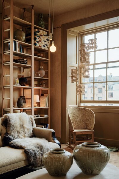 Stevens designed the ladder shelving system in the upstairs showroom.