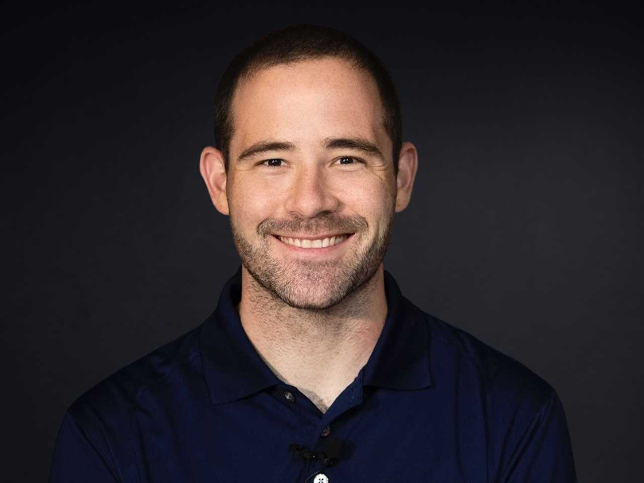 headshot of Mark Vlaskamp in front of black background