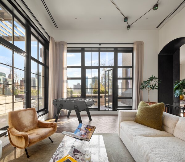 Since acquiring the property in 2017, Trevor has completed reconfigured the interior layout, turning what used to be the upper-floor primary suite—which features a terrace—into the main living area. According to listing agent, Nick Gavin, this decision was largely so guests would have access to the outdoors.