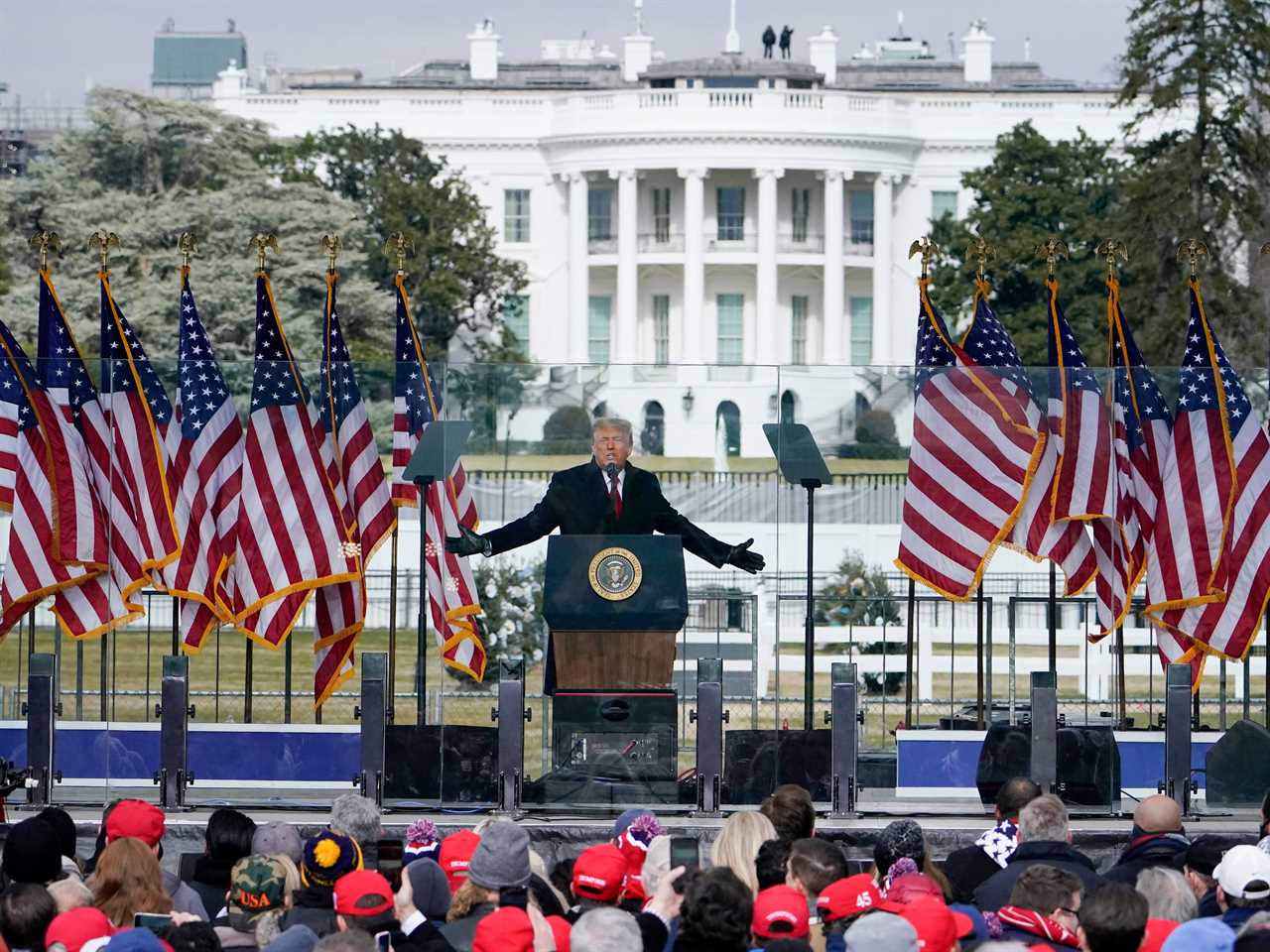 In this Jan. 6, 2021, file photo with the White House in the background, President Donald Trump speaks at a rally in Washington.