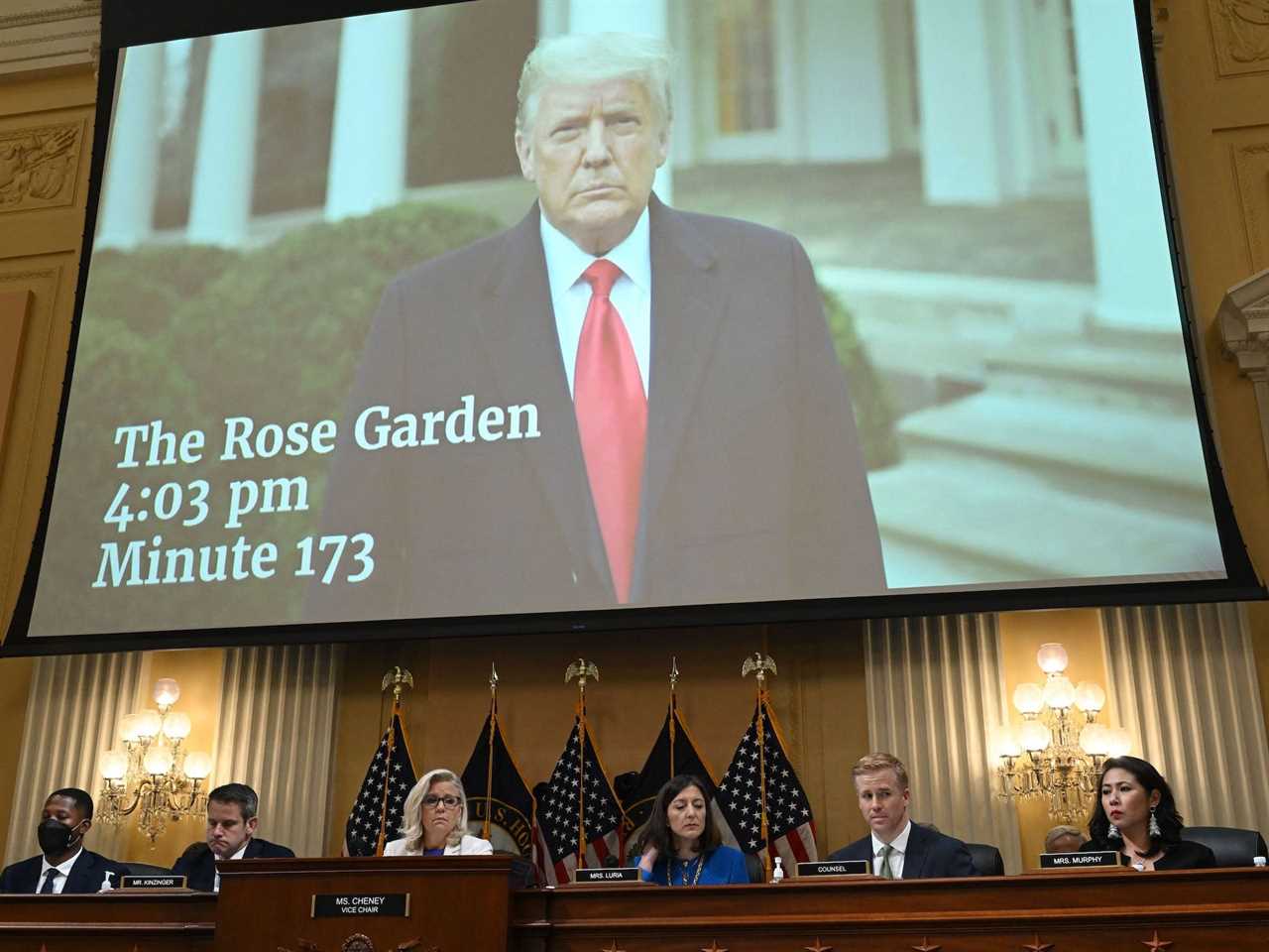 A January 6 video of Former US President Donald Trump telling his supporters to go home, is seen on screen during a hearing by the House Select Committee to investigate the January 6th attack on the US Capitol in the Cannon House Office Building in Washington, DC, on July 21, 2022.