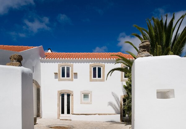 In pre-existing areas, the windows have wood-framed shutters with double glazing.