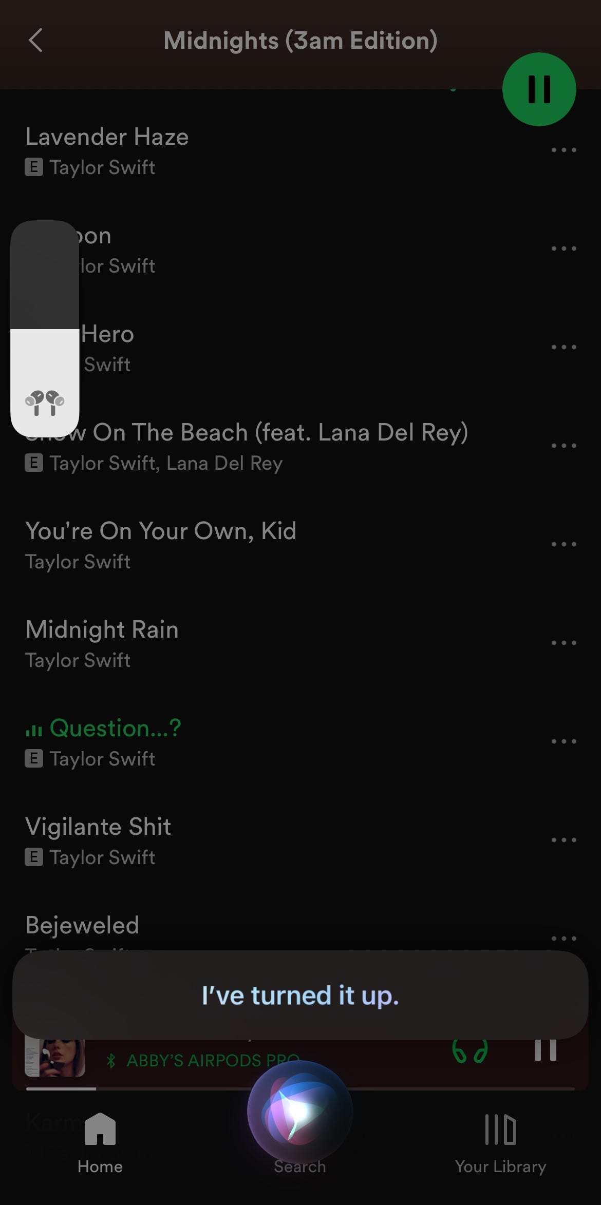 Spotify album with Siri icon and “I’ve turned it up” message.