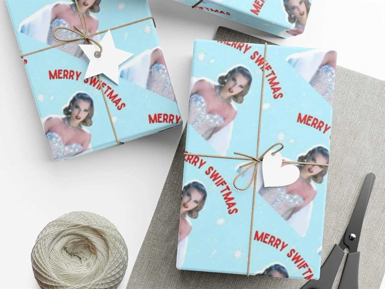 boxes wrapped with taylor swift themed wrapping paper