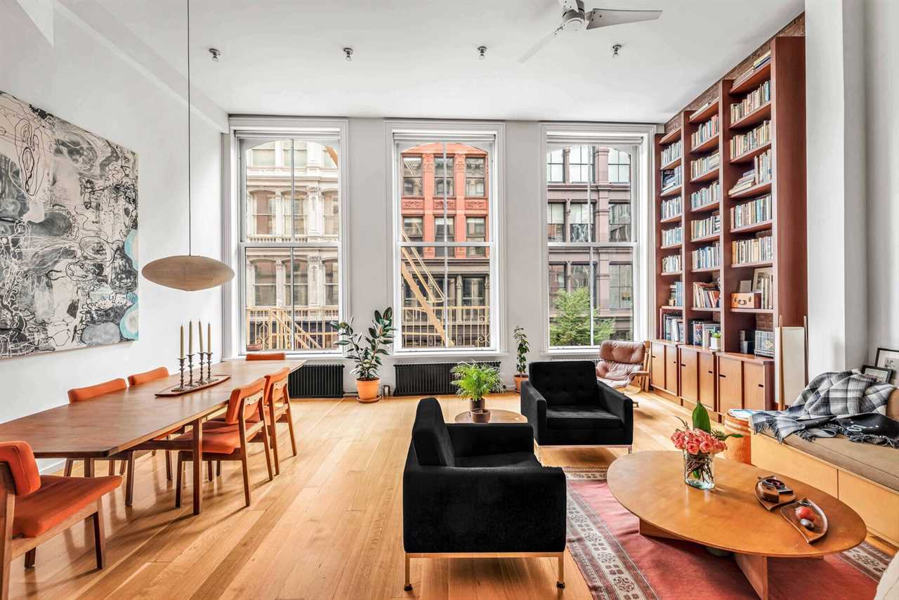 Set in a historic 19th-century building, the $4.4M apartment comes with 14-foot-tall ceilings, four bedrooms, and a wood-clad chef’s kitchen.