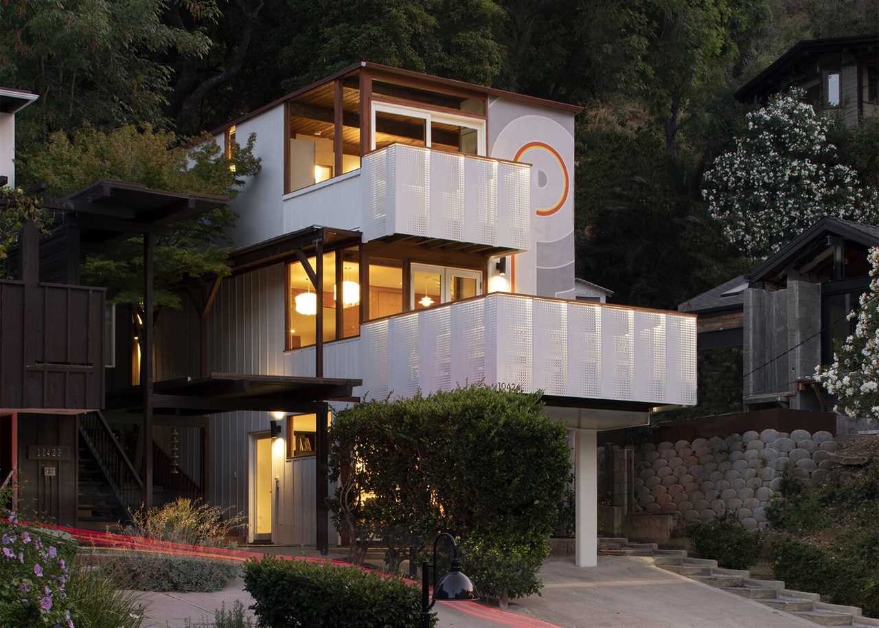 Listed for $1.5M, the renovated L.A. residence features a graphic facade inspired by the work of Barbara Stauffacher Solomon.