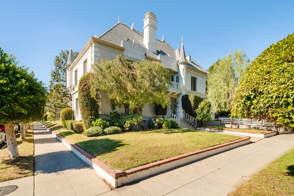 The French-inspired home sits on a large, corner lot in the Hollywood Dell district, offering easy access to many landmarks, including the Griffith Observatory and the Hollywood Sign.