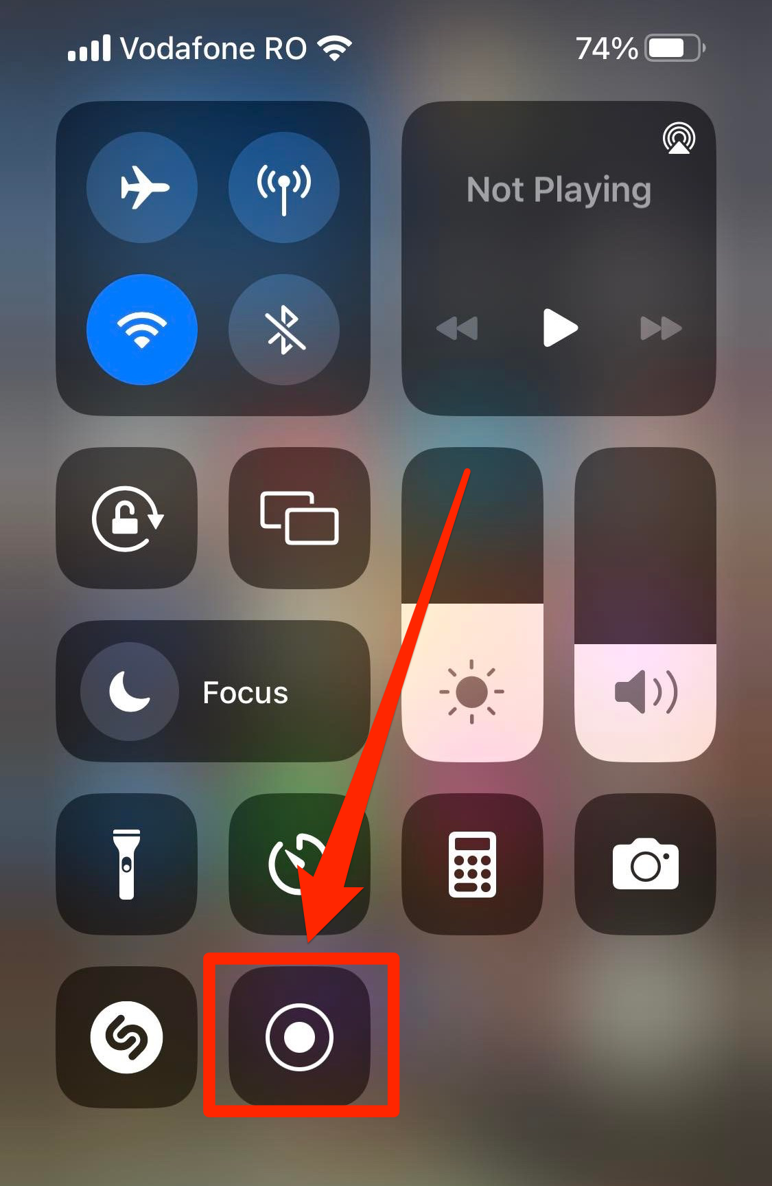 The Control Center on iPhone, with the "Record" button highlighted.