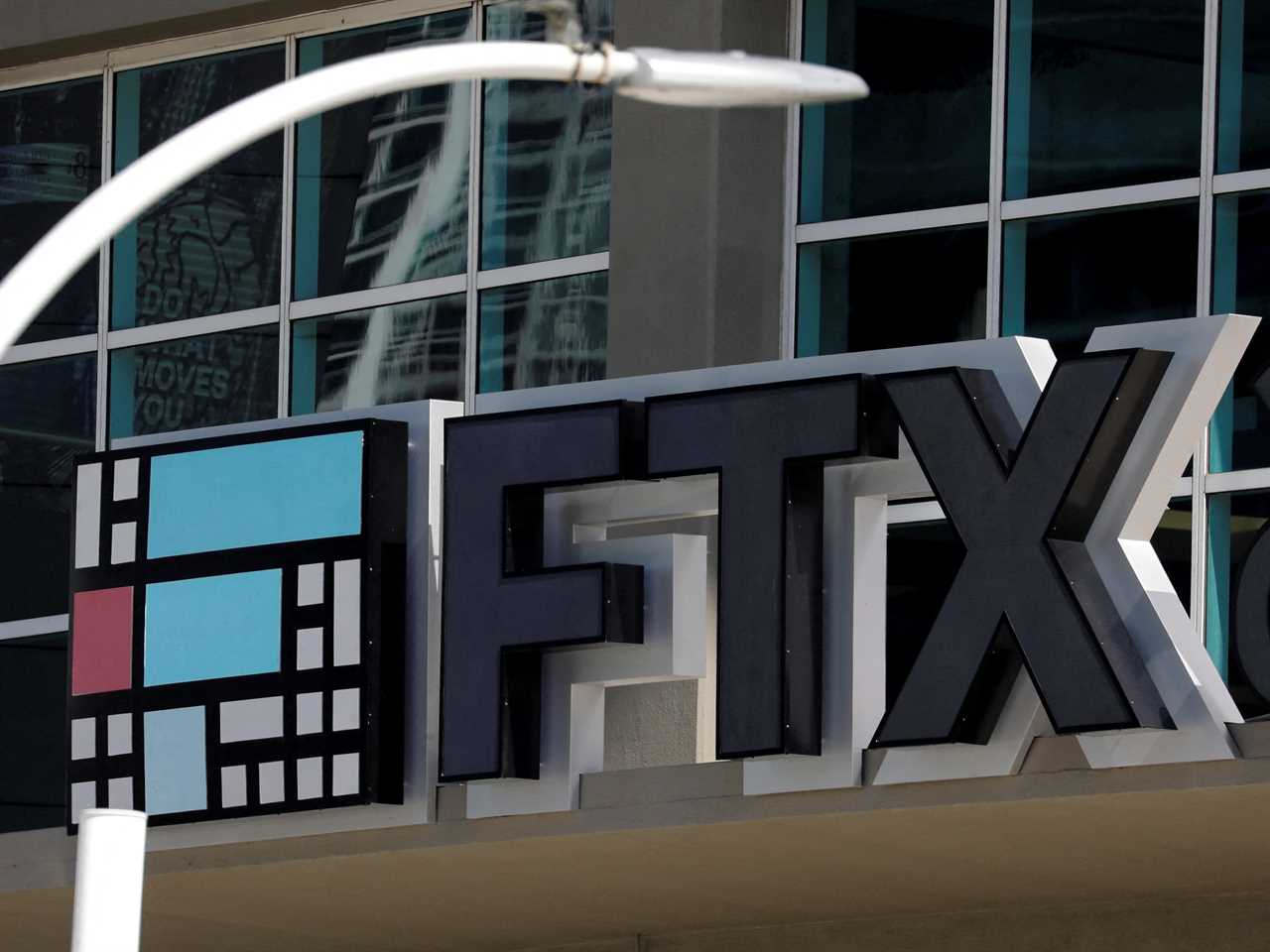 The logo of FTX is seen at the entrance of the FTX Arena in Miami, Florida, U.S., November 12, 2022.