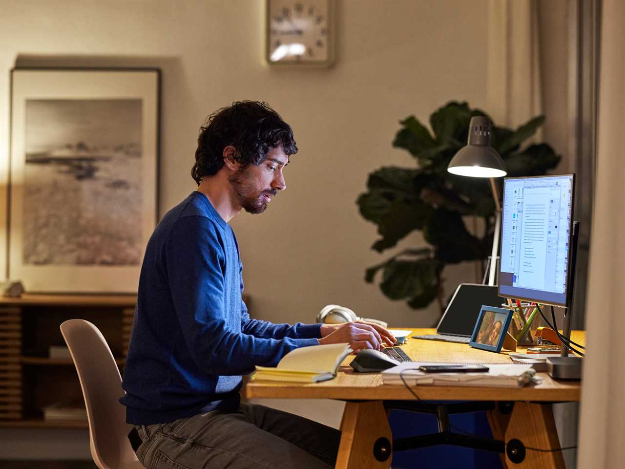 Man working remotely at computer.