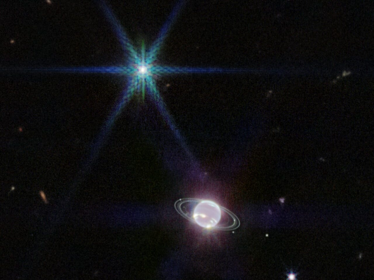 Webb’s Near-Infrared Camera (NIRCam) image of Neptune and its rings. Neptune has 14 known satellites, and seven of them are visible in this image.