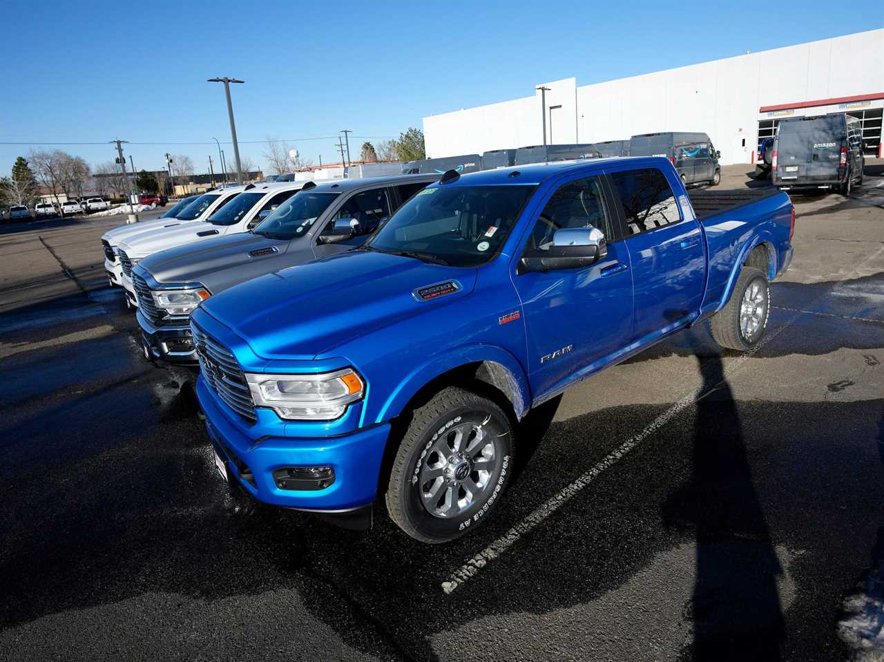 Pickup trucks at a car dealership.