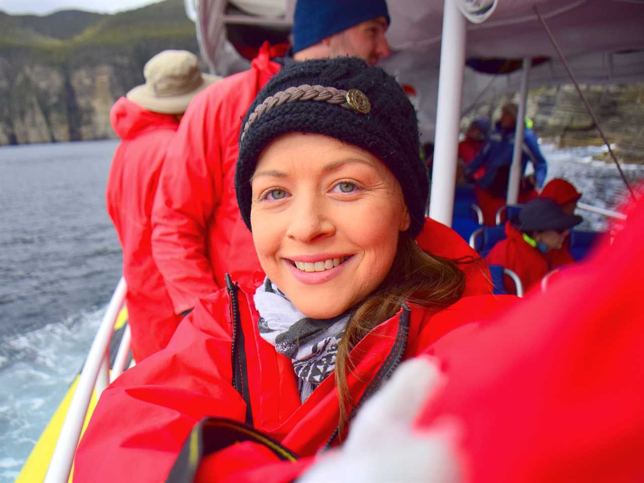 woman takes selfie on a boat