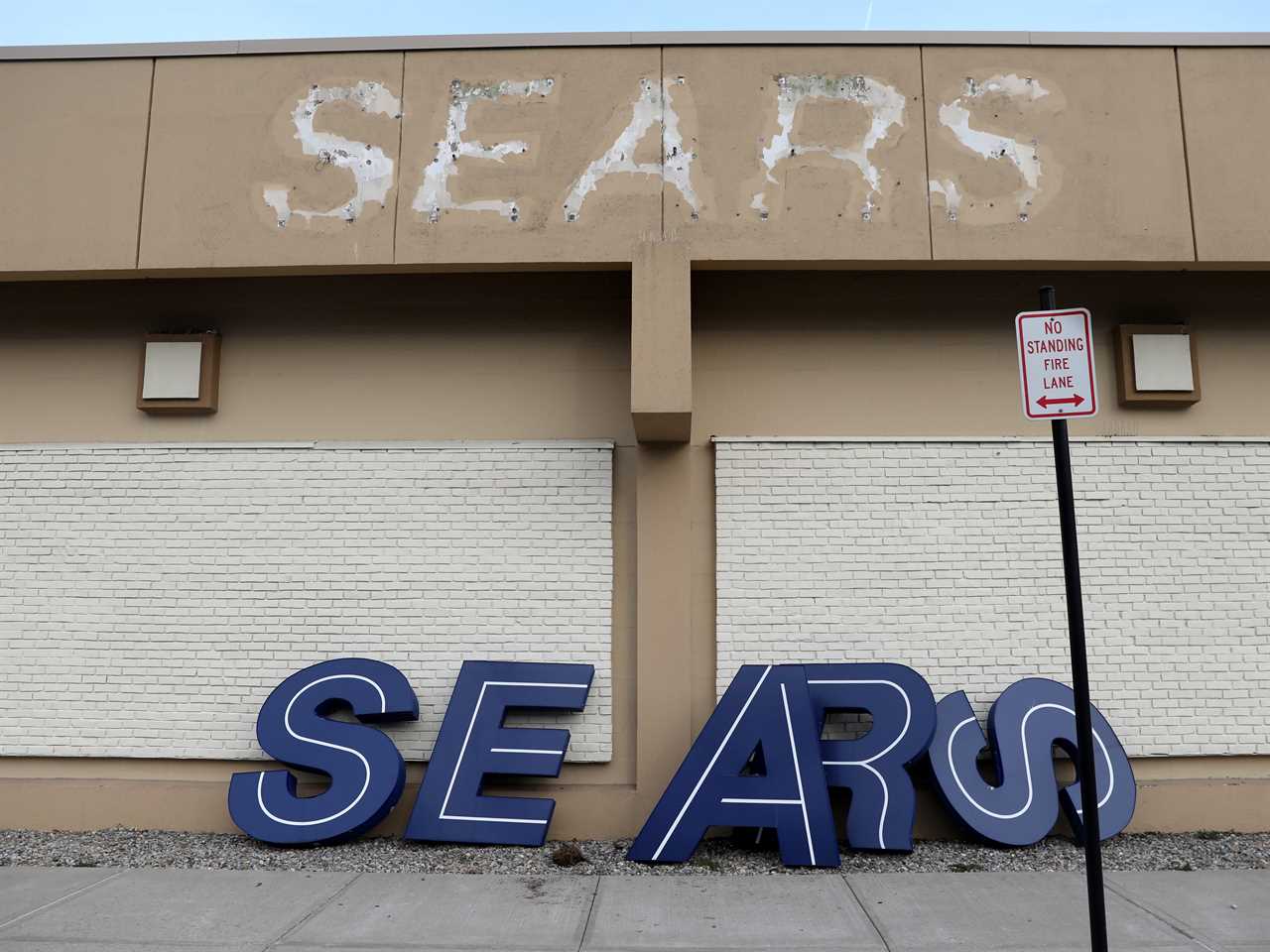 FILE PHOTO: A dismantled sign sits leaning outside a Sears department store one day after it closed as part of multiple store closures by Sears Holdings Corp in the United States in Nanuet, New York, U.S., January 7, 2019. REUTERS/Mike Segar