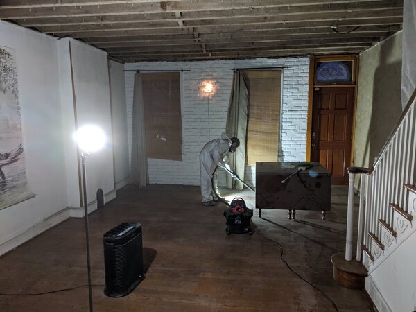 Before: The kitchen was relocated to the center of the house where the dining room used to be.