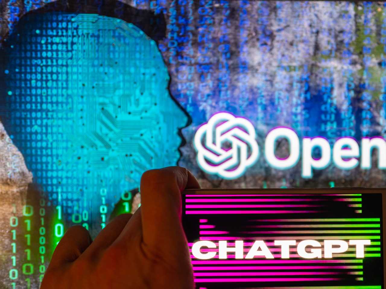 An image of a phone with ChatGPT and OpenAI's logo visible.