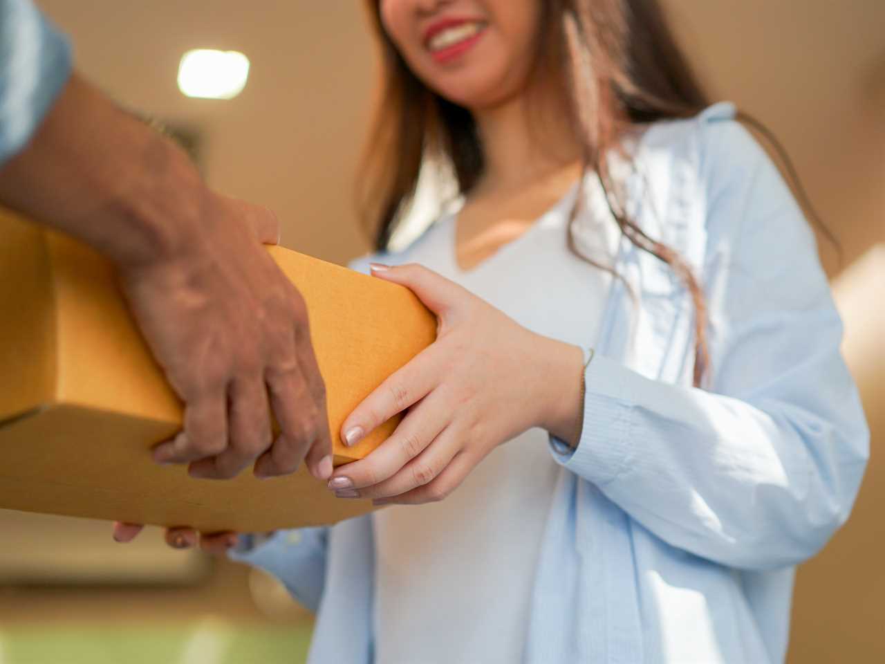 teen getting mail package