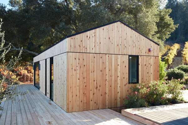 One of the first Dwell Houses recently landed near Leslie Scharf’s vineyard home in Healdsburg, California. Norm Architects led the design of the 540-square-foot prefab, which is wrapped in Real Cedar siding.