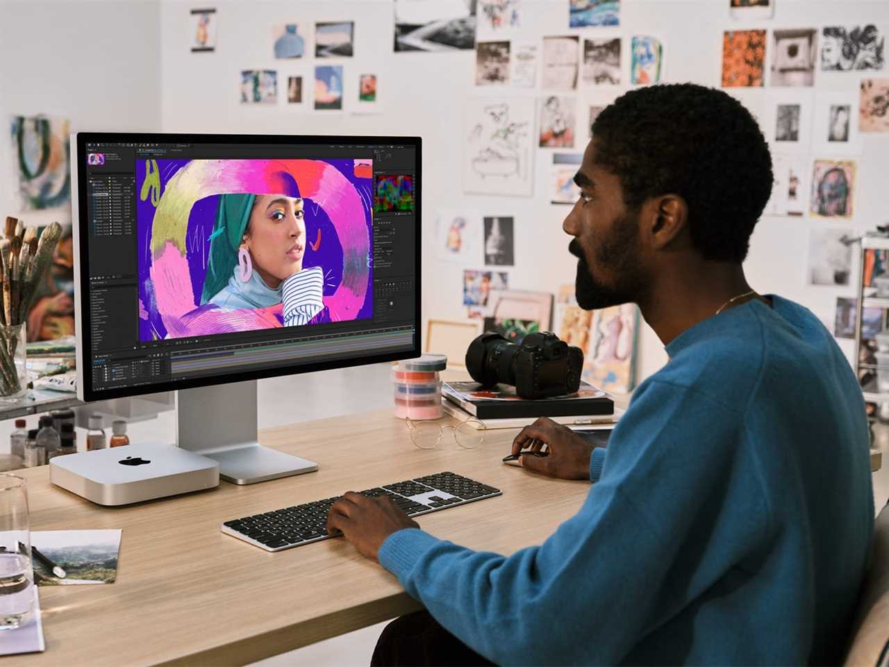 the all-new mac mini with m2 and m2 pro being used by an adult at a desk using adobe photoshop