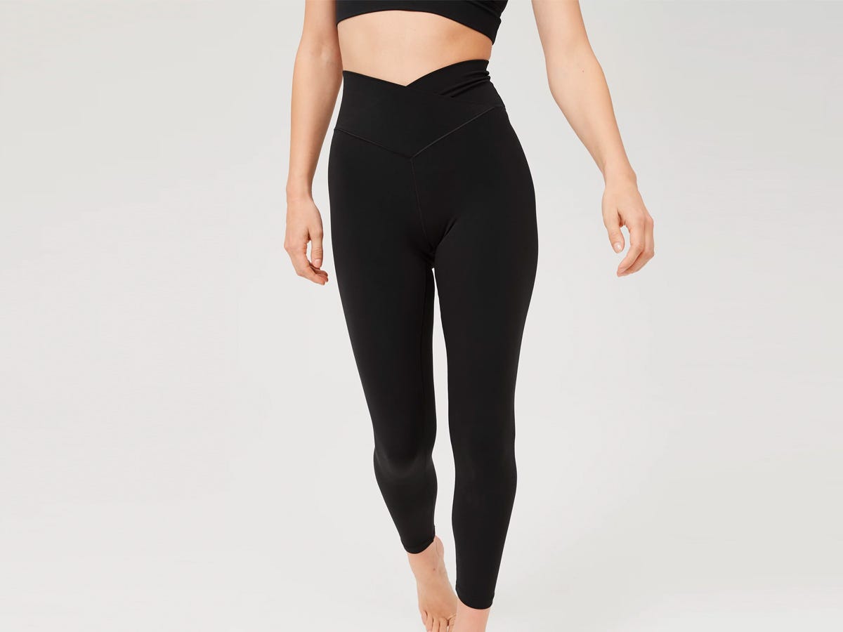 Model wearing black Aerie OFFLINE Real Me High Waisted Crossover Leggings