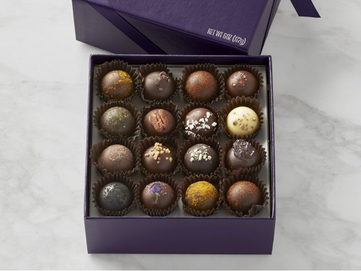 A box full of an assortment of exotic truffles from vosges.