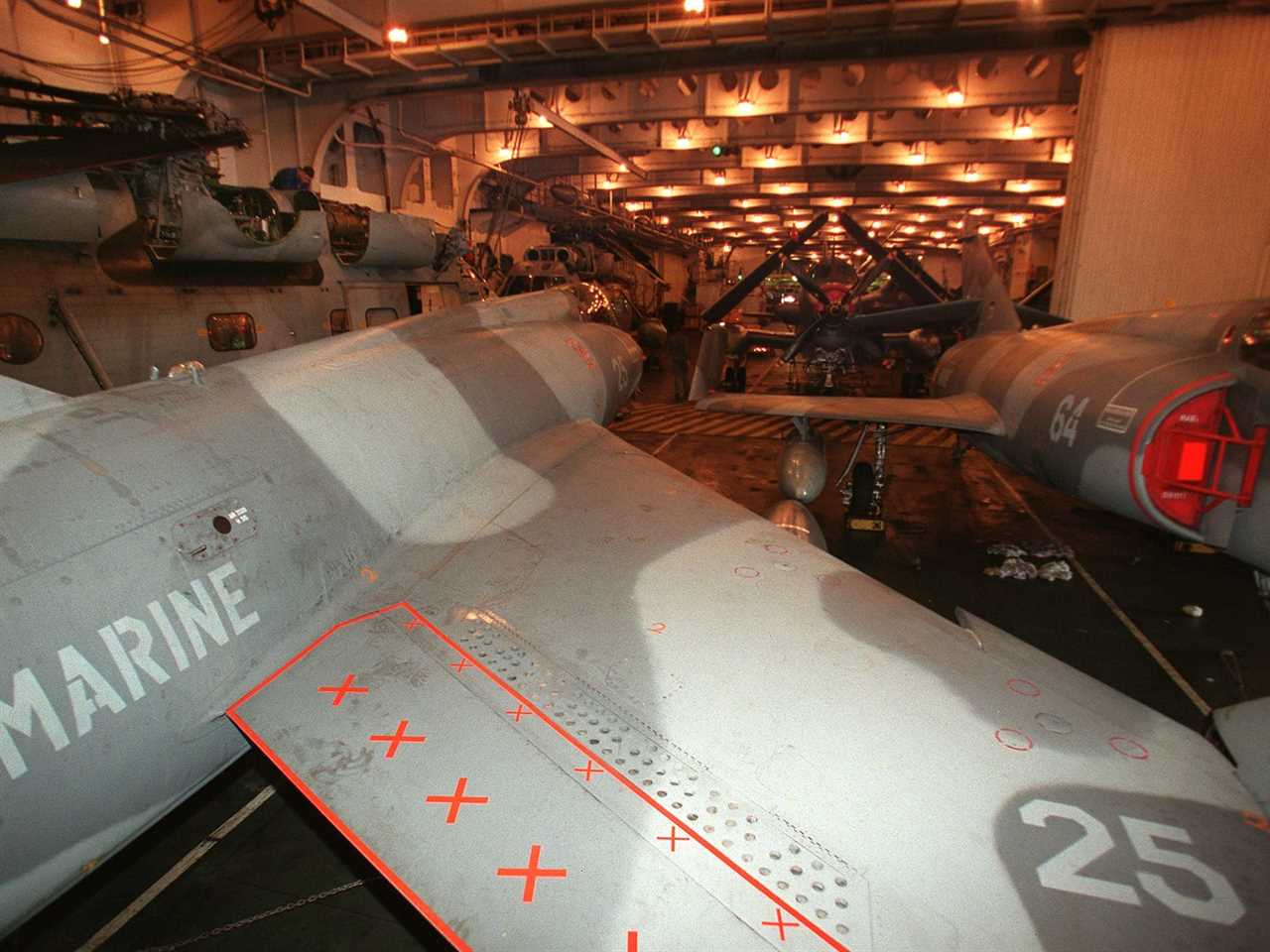 Super Etendard fighter planes are parked in the hull of French aircraft carrier "Foch" off the Italian coast, in the Adriatic Sea, 20 May 1999.