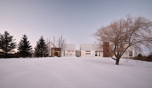 A Snow-White Home in Rural Ontario Freshens Up the Farmhouse Look