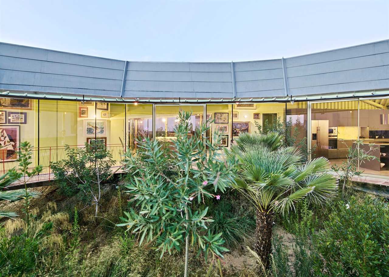 This Glass-Wrapped Home in Spain Is Regenerating Its Surrounding Ecosystem