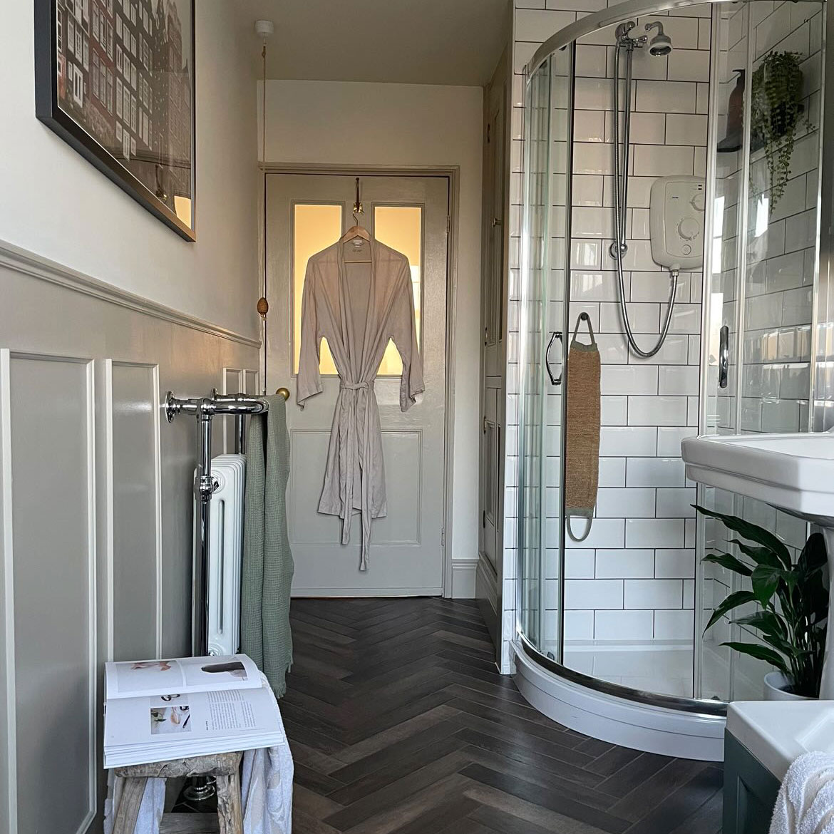 Bright airy bathroom with metro tiling and built-in storage